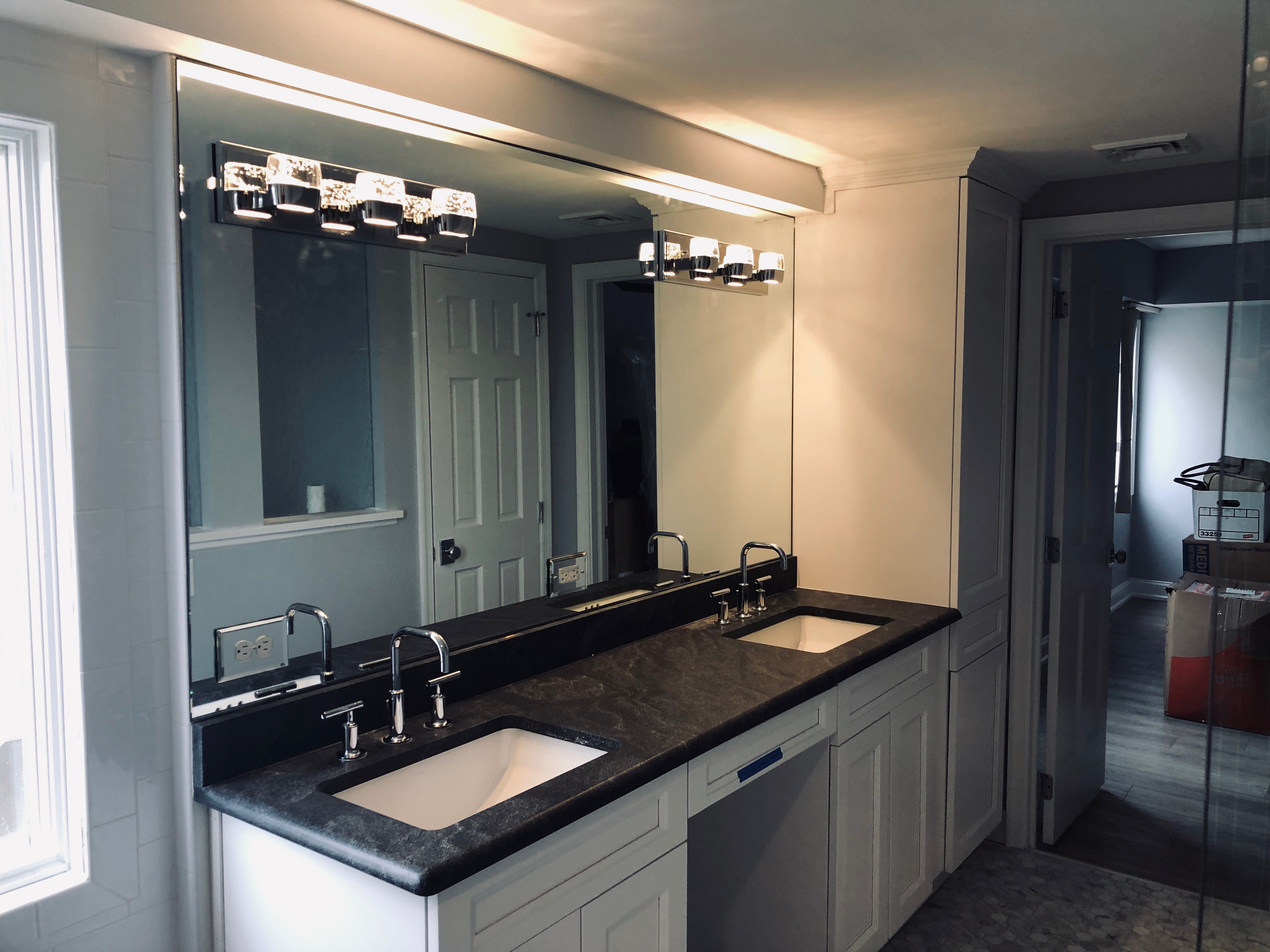 Custom bathroom mirror installation
